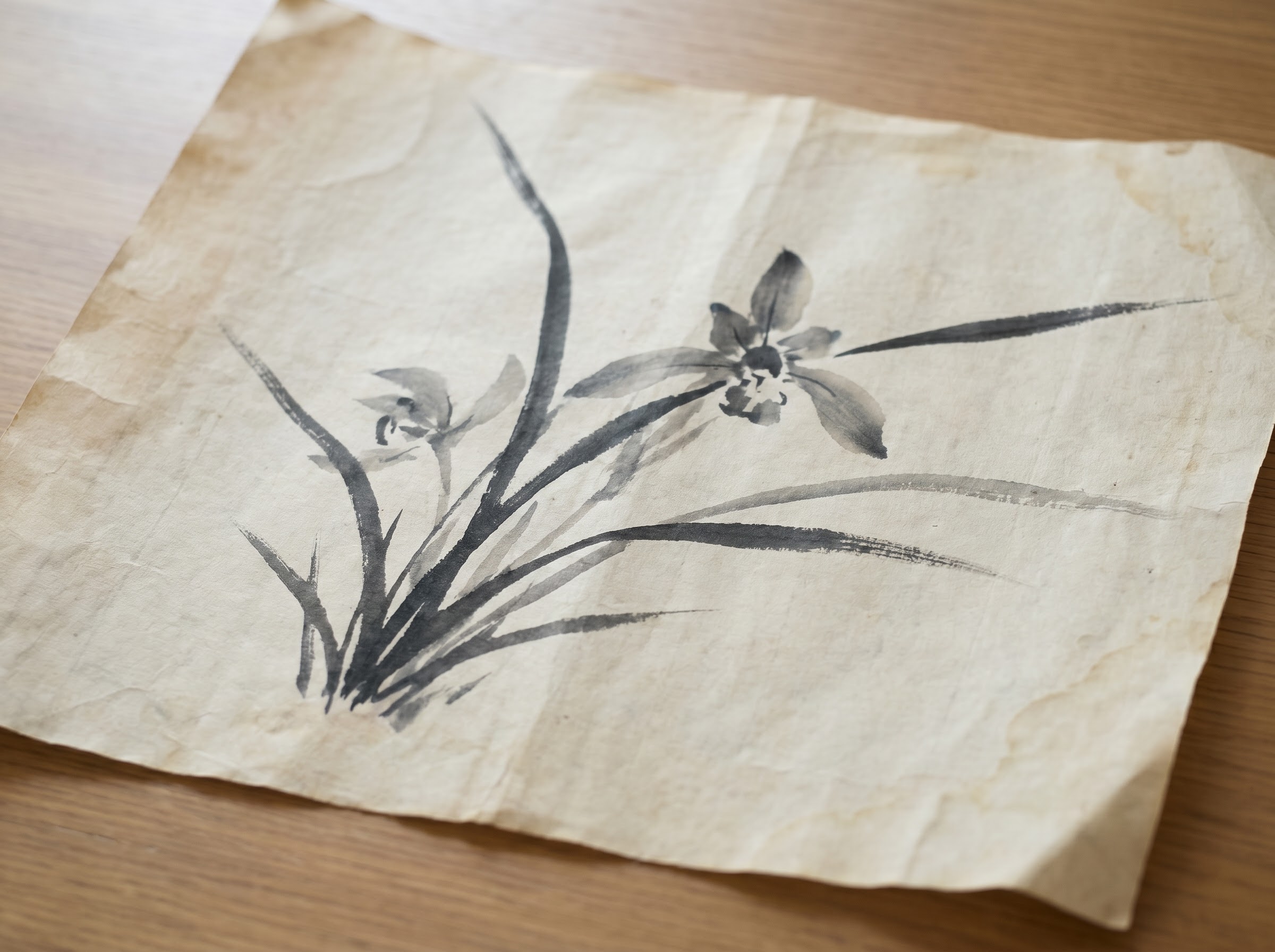Classical Chinese ink painting of an orchid, emblem of the noble scholar tradition